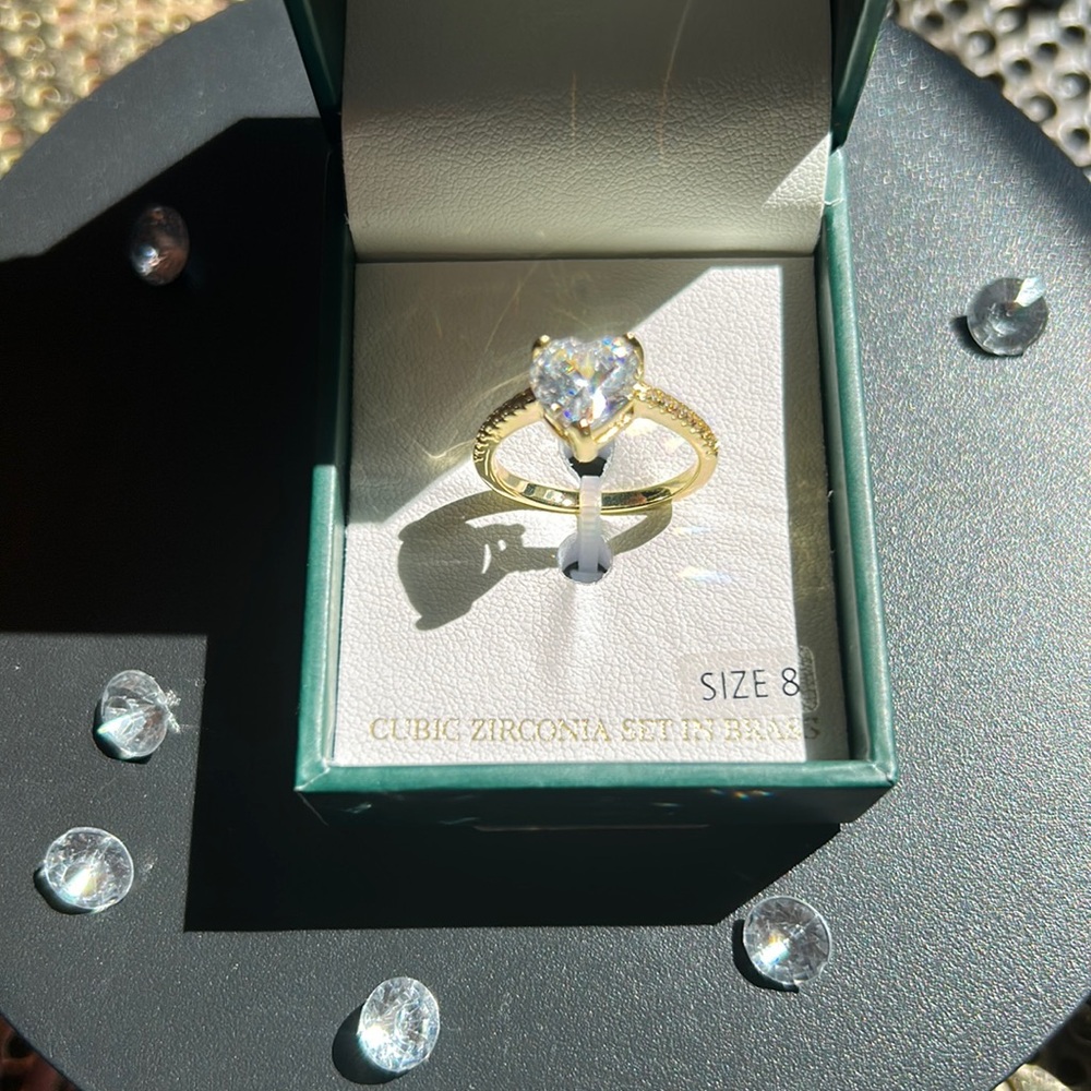 Cubic Zirconia heart ring size 8. Gold tone set in brass NIB